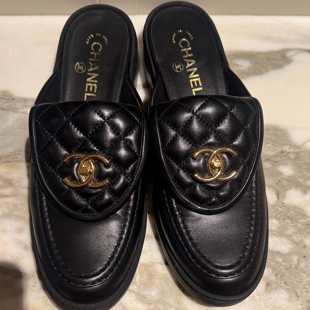 CHANEL Black Quilted Leather Mules with Gold Logo size 40.5